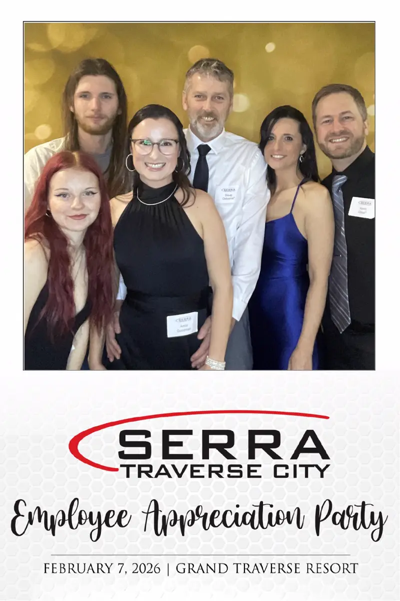 Serra Traverse City employees posing in FastBooth photo booth at the 2026 Employee Appreciation Party at Grand Traverse Resort