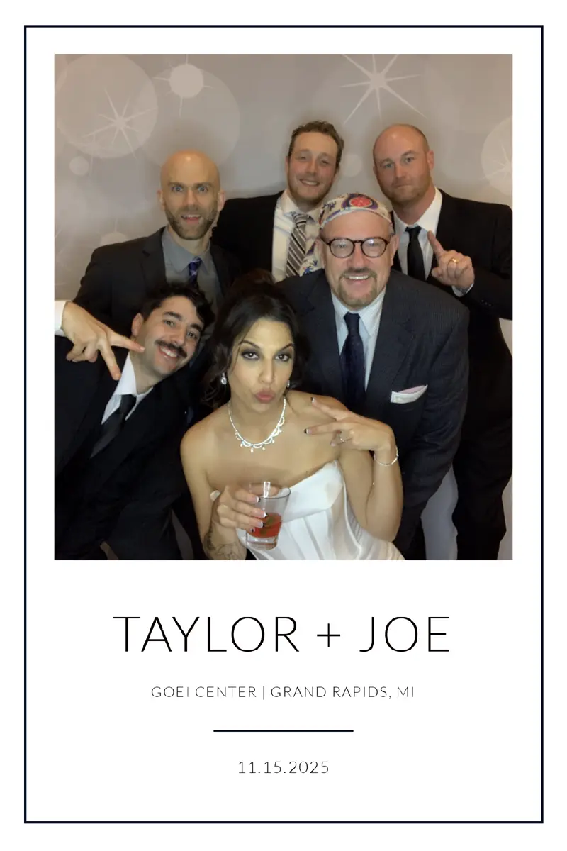 Wedding photo booth print of bride and wedding party at GOEI Center in Grand Rapids, Michigan